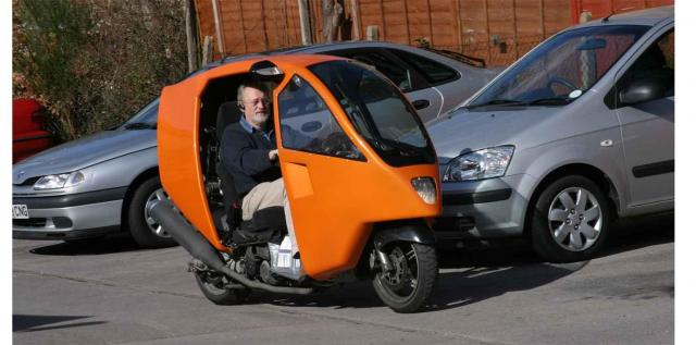 a) Ian P in Genesis Mk3 Burgman 650