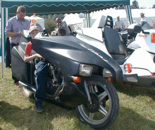 John Bruce (standing) with one of his Honda Dream 400 Codas