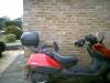 Neat rider seat back for Honda Helix.